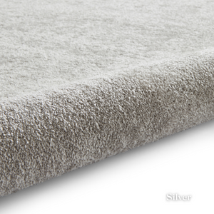 Brighten you room with the Cove Washable Collection Machine Made Rugs featuring washable design, soft shaggy pile and stain resistant