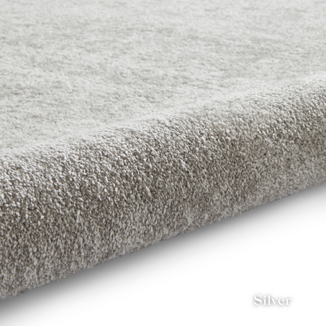 Brighten you room with the Cove Washable Collection Machine Made Rugs featuring washable design, soft shaggy pile and stain resistant