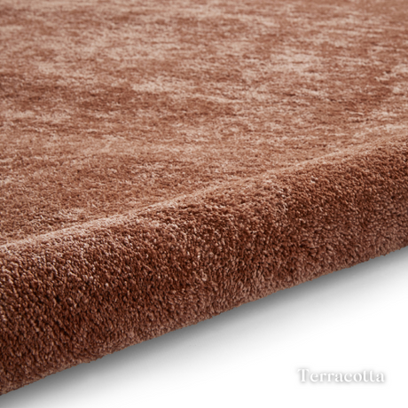 Brighten you room with the Cove Washable Collection Machine Made Rugs featuring washable design, soft shaggy pile and stain resistant