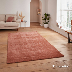 Brighten you room with the Cove Washable Collection Machine Made Rugs featuring washable design, soft shaggy pile and stain resistant