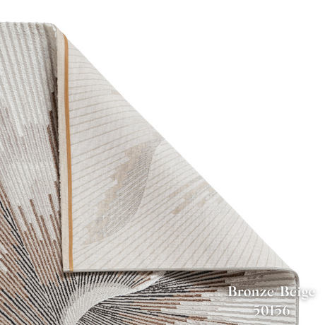 Elevate your style with the Creation Modern Abstract Machine Made Rugs Range featuring metallic yarn, textured piles and artistic pattern.