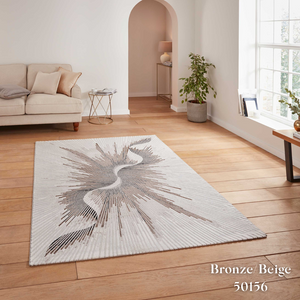 Elevate your style with the Creation Modern Abstract Machine Made Rugs Range featuring metallic yarn, textured piles and artistic pattern.