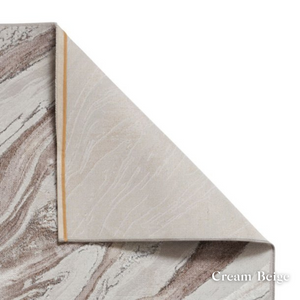 Elevate your style with the Creation Modern Abstract Machine Made Rugs Range featuring metallic yarn, textured piles and artistic pattern.