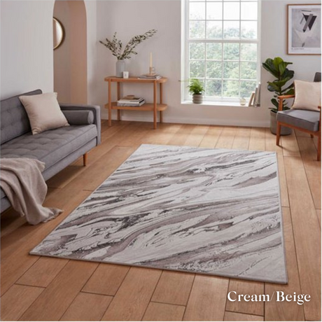 Elevate your style with the Creation Modern Abstract Machine Made Rugs Range featuring metallic yarn, textured piles and artistic pattern.