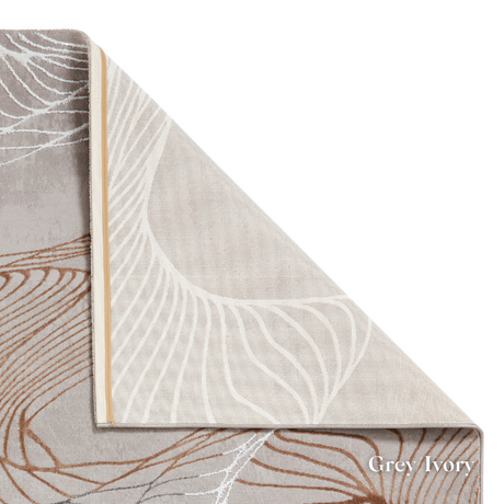 Elevate your style with the Creation Modern Abstract Machine Made Rugs Range featuring metallic yarn, textured piles and artistic pattern.