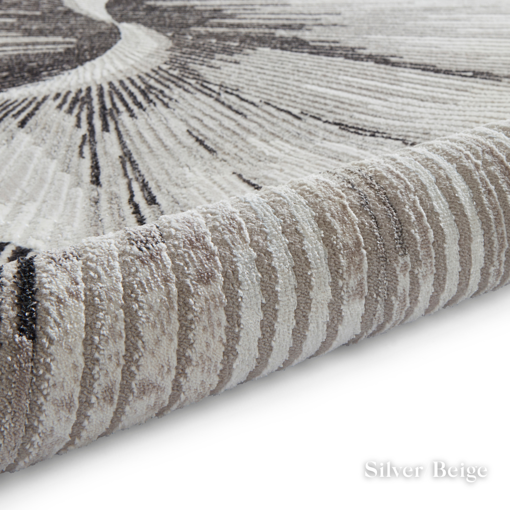 Elevate your style with the Creation Modern Abstract Machine Made Rugs Range featuring metallic yarn, textured piles and artistic pattern.
