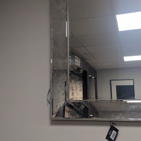 The Croften Rectangular Mirror with antique silver finish adds light space and timeless elegance to any room in your home