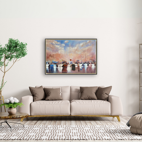 With a gold & black frame for stylish coastal charm, Dawn Harbour hand-painted art (100x150 cm) depicts a calm marina scene with warm hues & rich textures.