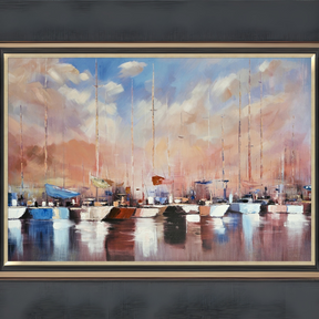 With a gold & black frame for stylish coastal charm, Dawn Harbour hand-painted art (100x150 cm) depicts a calm marina scene with warm hues & rich textures.