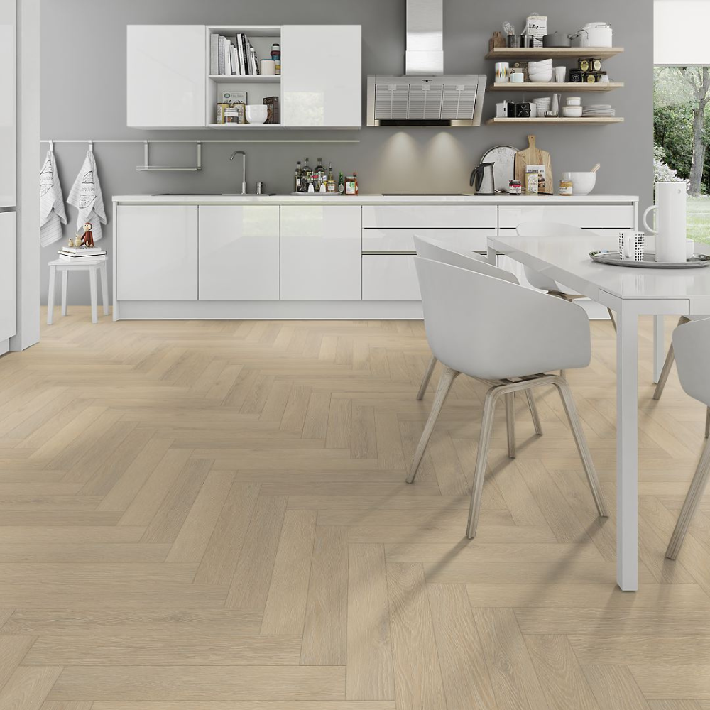 The Denver Oak Herringbone Laminate Flooring - 12mm features soft oak tones, AC4 durability, V Groove Bevel, embossed texture and easy DocLoc installation