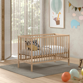 The Dino Baby Cot Bed 60 x 120cm in Natural features a European beech material, smooth lacquered finish and a 3 height adjustable slatted base