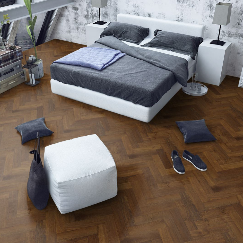 The Double Smoked Oak Herringbone Engineered Flooring - 15mm features deep smoked tones, rich grain detail and durable multi layer stability