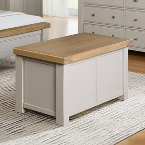 The Doune Blanket Box in Taupe features storage elegant solution with a slow-close lid, oak veneer top and ample space