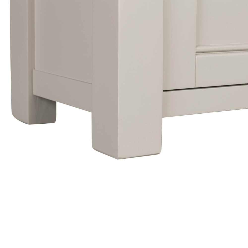 The Doune Tall Bookcase in Taupe features sleek design, oak veneer top and a hidden cabinet storage.
