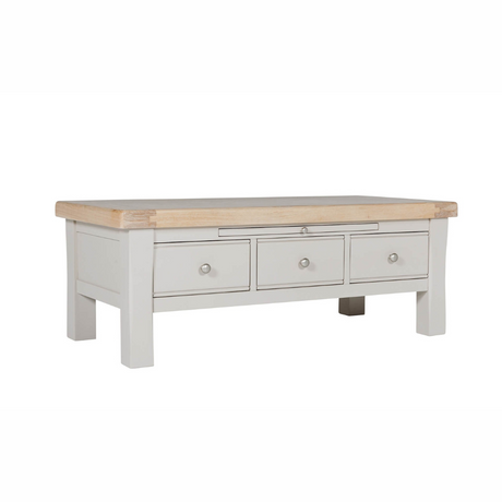 The Doune Coffee Table in Taupe features oak veneer top, three storage drawers with sleek handles and a versatile design.