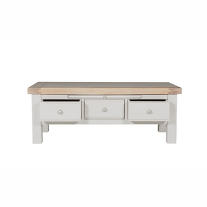 The Doune Coffee Table in Taupe features oak veneer top, three storage drawers with sleek handles and a versatile design.