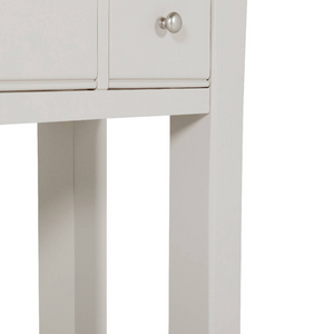 The Doune Console Table in Taupe features a sleek taupe finish, design with three drawers and a lower slatted shelf.