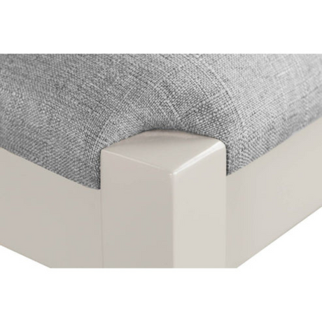 Upgrade your home with the Doune Dining Chair Fabric in Grey featuring a tall back, plush padded seat and chic painted finish.