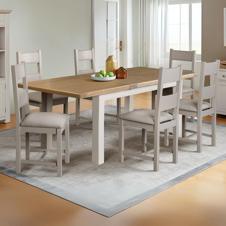 Upgrade your home with the Doune Dining Chair Fabric in Grey featuring a tall back, plush padded seat and chic painted finish.