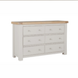 The Doune 6-Drawer Dressing Chest in Taupe features 6 spacious drawers, oak veneer top and sleek metal handles.