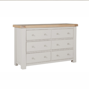 The Doune 6-Drawer Dressing Chest in Taupe features 6 spacious drawers, oak veneer top and sleek metal handles.
