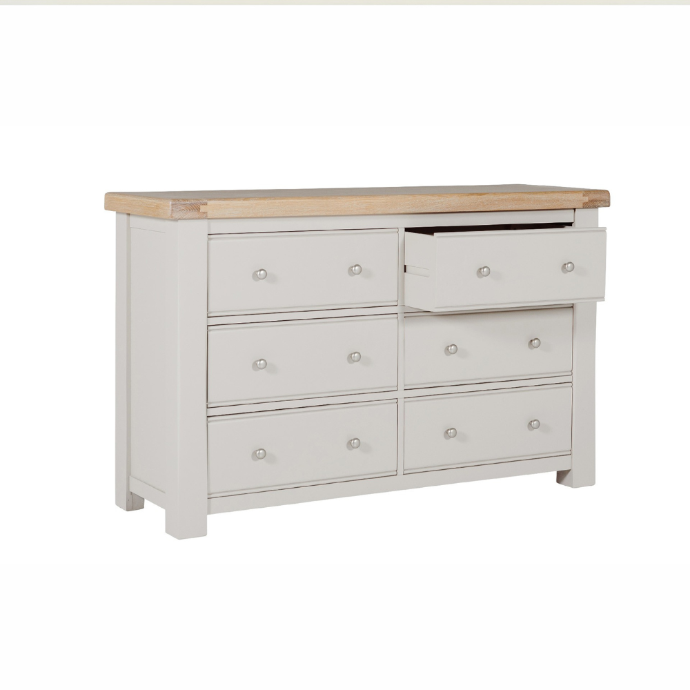 The Doune 6-Drawer Dressing Chest in Taupe features 6 spacious drawers, oak veneer top and sleek metal handles.