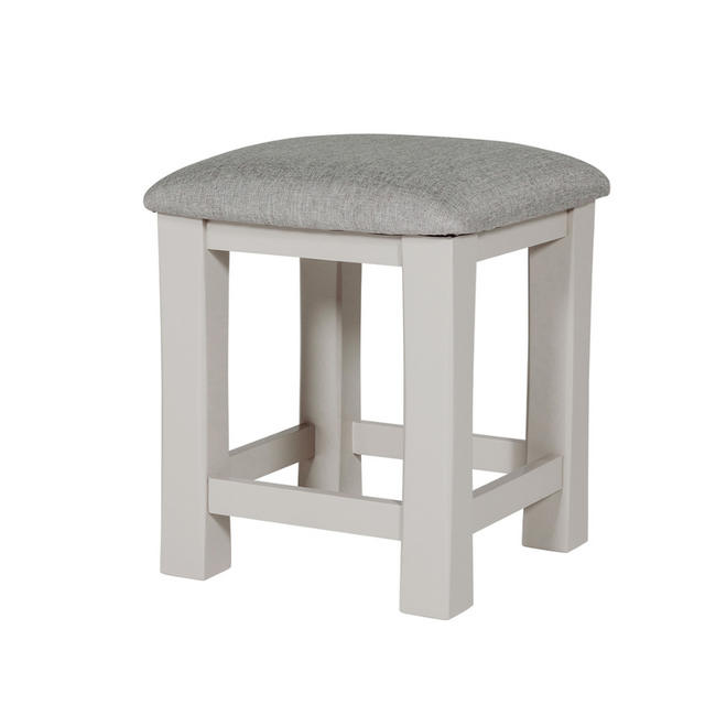 The Doune Dressing Stool in Taupe features padded cushion seat and elegant painted finish; perfect for bedroom or vanity space.