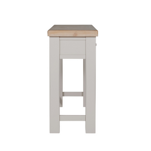 The Doune Dressing Table in Taupe features oak veneer top, 2 drawers and sleek metal handles, practical for any dressing space.