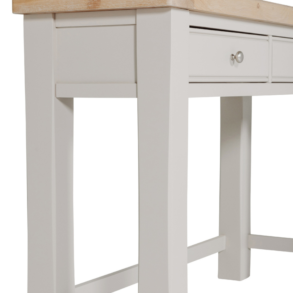 The Doune Dressing Table in Taupe features oak veneer top, 2 drawers and sleek metal handles, practical for any dressing space.