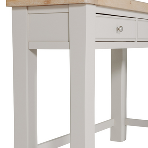 The Doune Dressing Table in Taupe features oak veneer top, 2 drawers and sleek metal handles, practical for any dressing space.