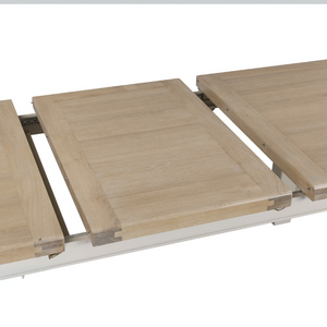 The Doune 1200/1650 Extending Dining Table in Taupe features oak veneer top, taupe-painted legs and smooth extension