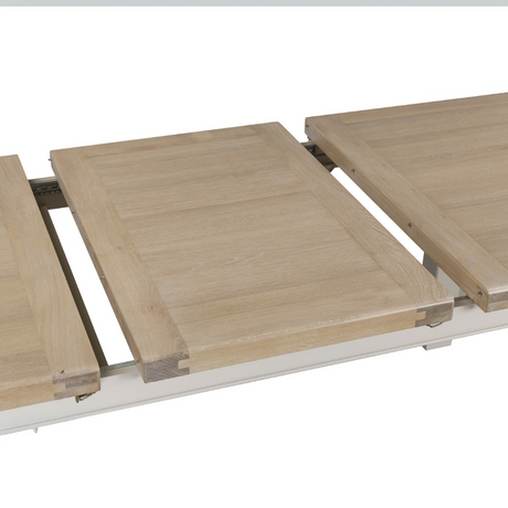 The Doune 1200/1650 Extending Dining Table in Taupe features oak veneer top, taupe-painted legs and smooth extension