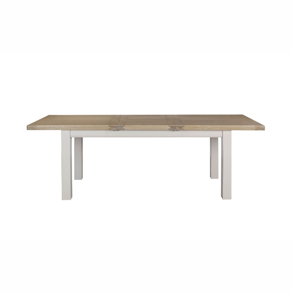 The Doune 1200/1650 Extending Dining Table in Taupe features oak veneer top, taupe-painted legs and smooth extension