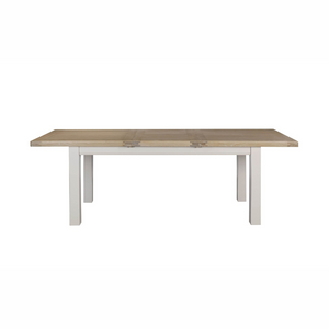 The Doune 1200/1650 Extending Dining Table in Taupe features oak veneer top, taupe-painted legs and smooth extension