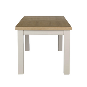 The Doune 1200/1650 Extending Dining Table in Taupe features oak veneer top, taupe-painted legs and smooth extension