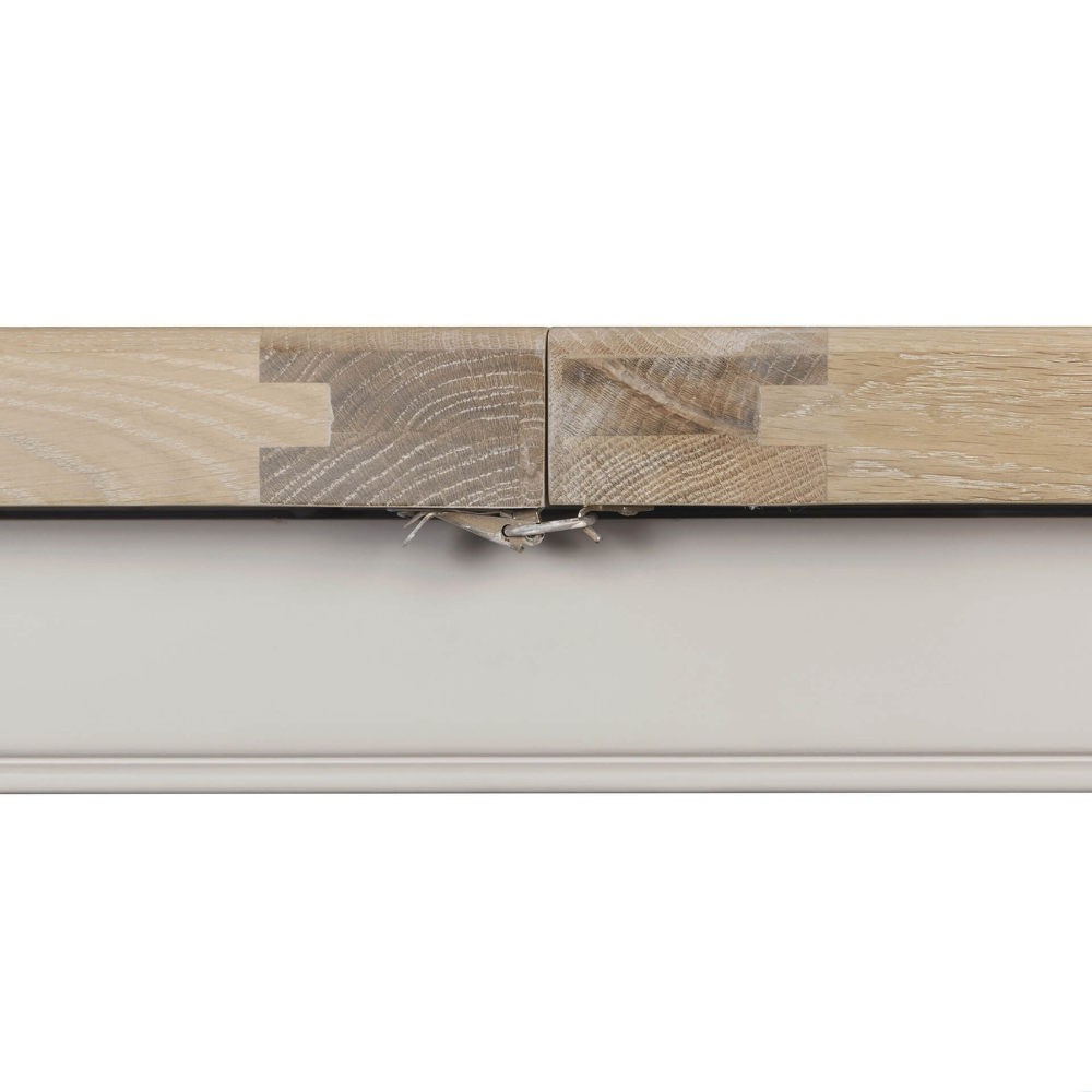 The Doune 1200/1650 Extending Dining Table in Taupe features oak veneer top, taupe-painted legs and smooth extension