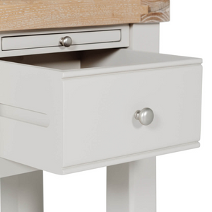 The Doune Table Lamp in Taupe features a refined painted finish. Ideal for lamps, adding elegance and function to any room.