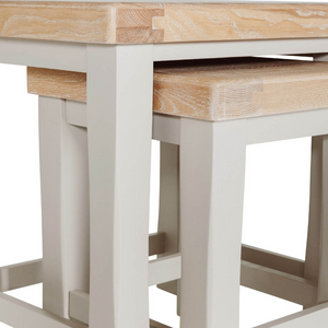 The Doune Nest of Tables in Taupe features oak top offers, versatility and painted finish, perfect for adaptable functionality.