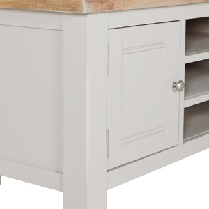 The Doune 1400 TV Unit in Taupe features oak top, dual cabinets with shelves and open space with cable cut-out.