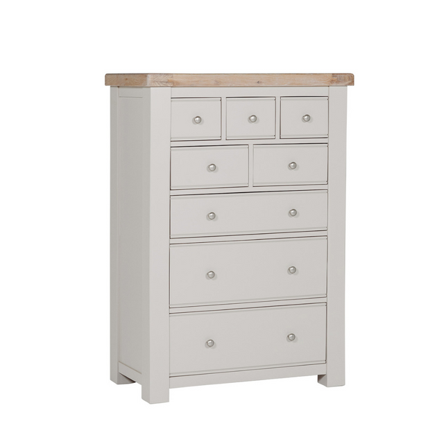 The Doune Tall Chest 8 Drawer in Taupe features oak veneer top and metal handles; ample storage with a chic finish.