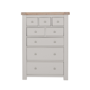 The Doune Tall Chest 8 Drawer in Taupe features oak veneer top and metal handles; ample storage with a chic finish.