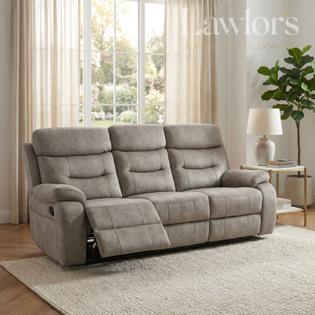 Cream 3 seater reclining sofa in a living room with large windows and a plant.