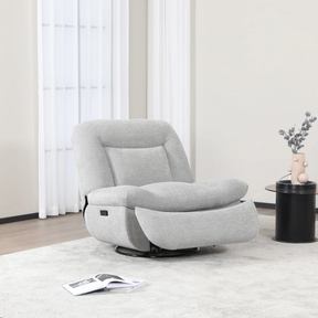 The Ebba Reclining Chair in Light Grey is upholstered in flat bouclé fabric, swivel function and electric recline for adjusting