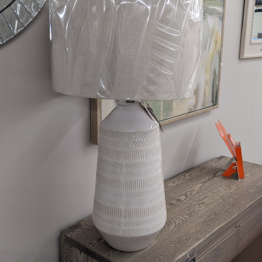 The Eden Ceramic Table Lamp 82cm is a statement lamp with a sleek ceramic finish, modern elegance and versatile style for both modern and classic interiors