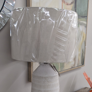 The Eden Ceramic Table Lamp 82cm is a statement lamp with a sleek ceramic finish, modern elegance and versatile style for both modern and classic interiors