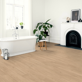 The Elba Oak Gold Laminate Flooring - 12mm features AC5 durability, Aqua Pearl spill resistance and light oak