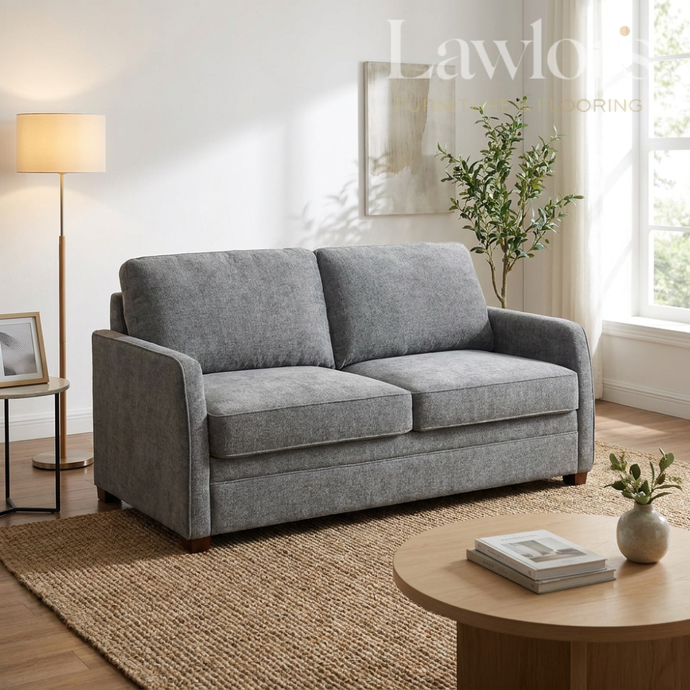 Light grey sofa bed in a living room
