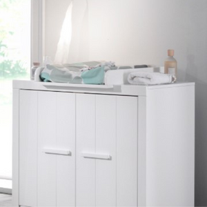 The Erik Baby Dresser with Changing Unit in White features a safe changing table space with 2 door storage, solid pine/MDF build and wall mount option