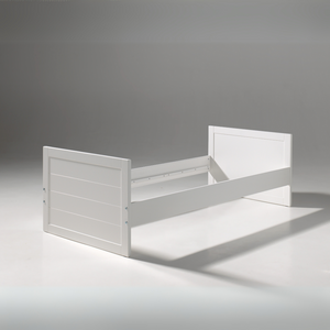 The Erik Convertible Kids Bed in White can convert from a 90 x 200cm bed to a 60 x 120cm baby cot, made from solid pine/MDF with stylish Belgian design