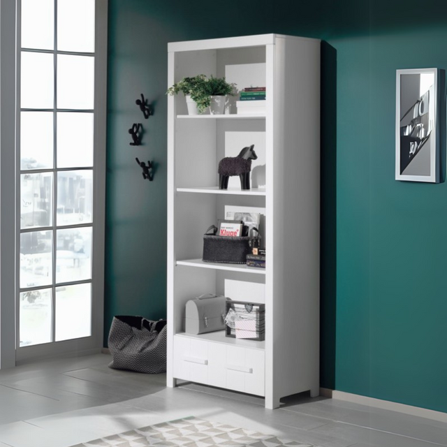 Add brightness & functionality to your child's room with the Erik Kids Bookcase in White featuring 4 shelves, 1 drawer, durable pine/MDF & vertical grooves